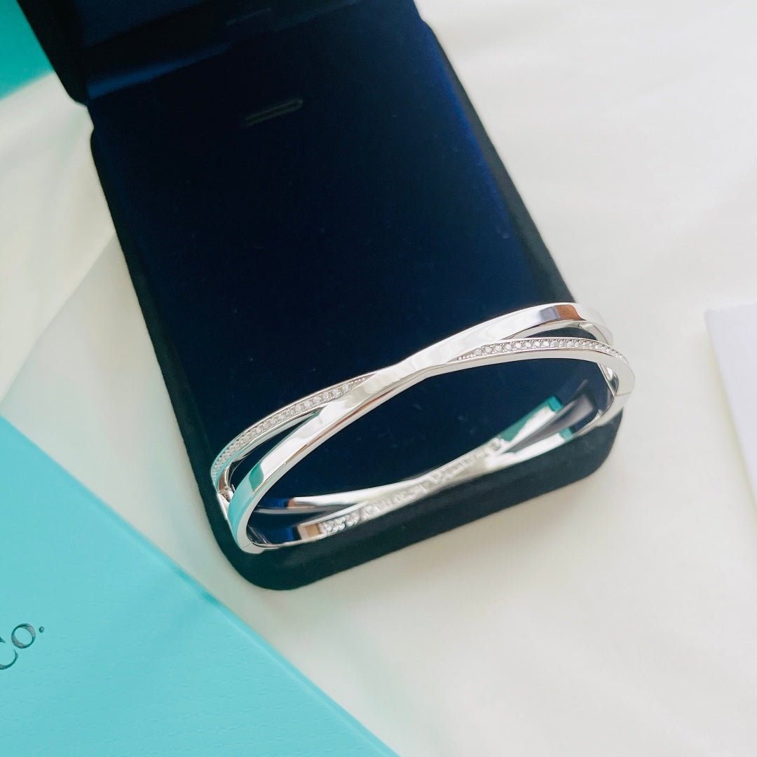 NARROW HINGED BANGLE WITH SMALL DIAMONDS