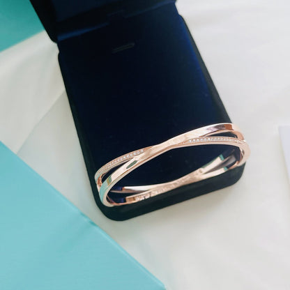 NARROW HINGED BANGLE WITH SMALL DIAMONDS