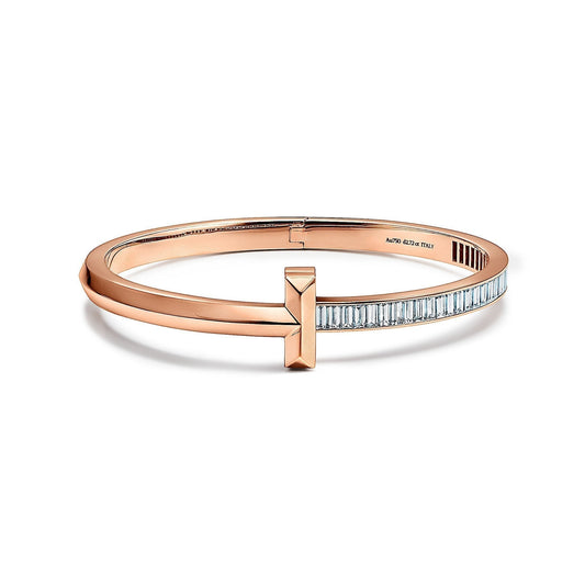 WIDE HINGED BANGLE PINK GOLD WITH BAGUETTE DIAMONDS